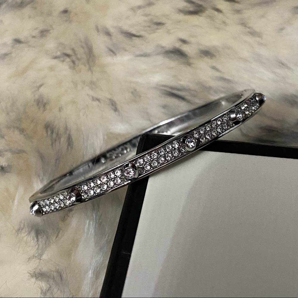 Silver Michael kors hinged bracelet with crystals