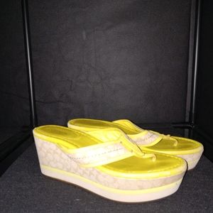 Coach NY wedges.