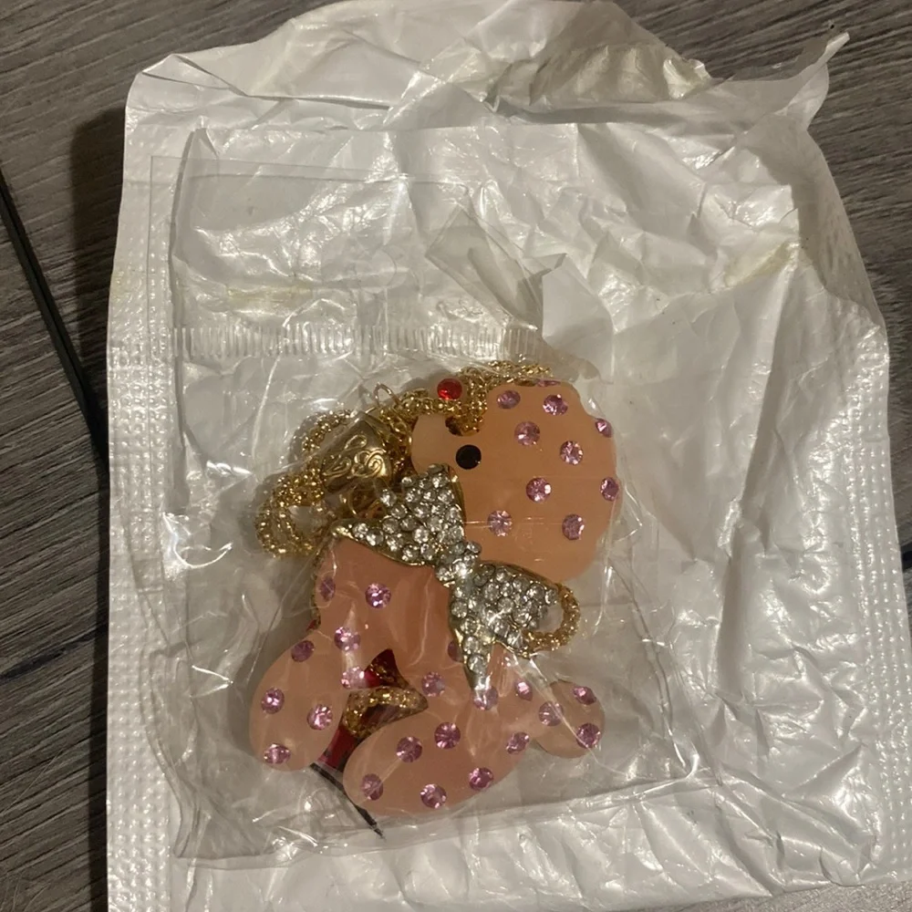New In package never opened poodle dog necklace . - Picture 1 of 6