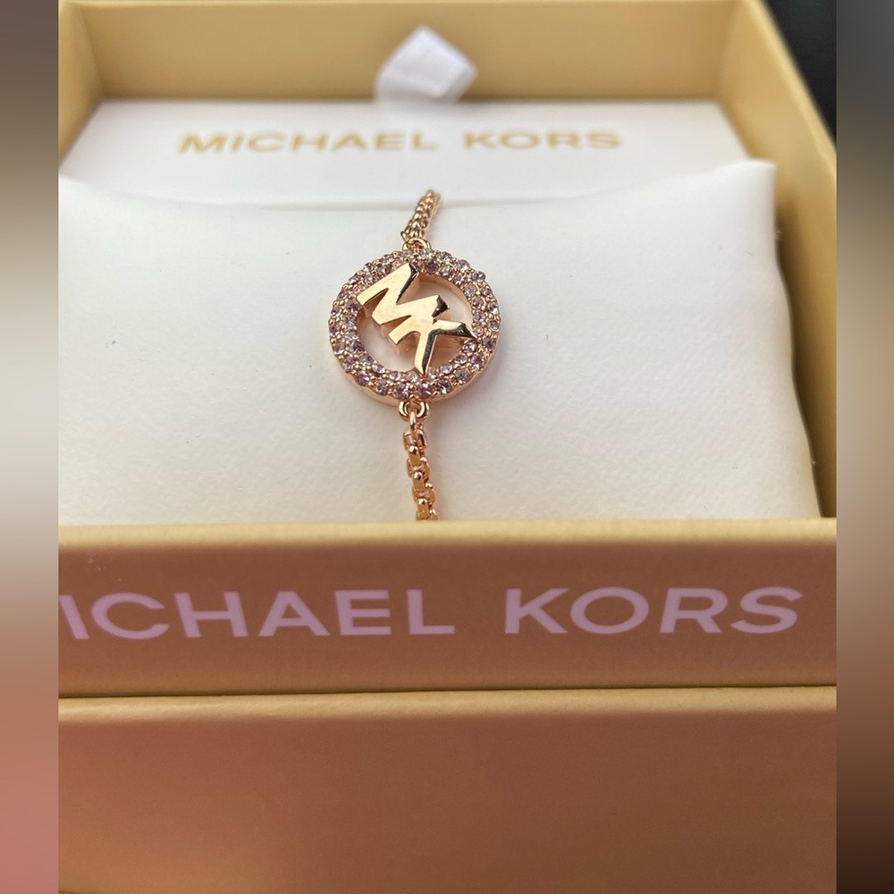 NWT! Michael Kors slider bracelet in rose gold. Pave MK logo with rhinestones