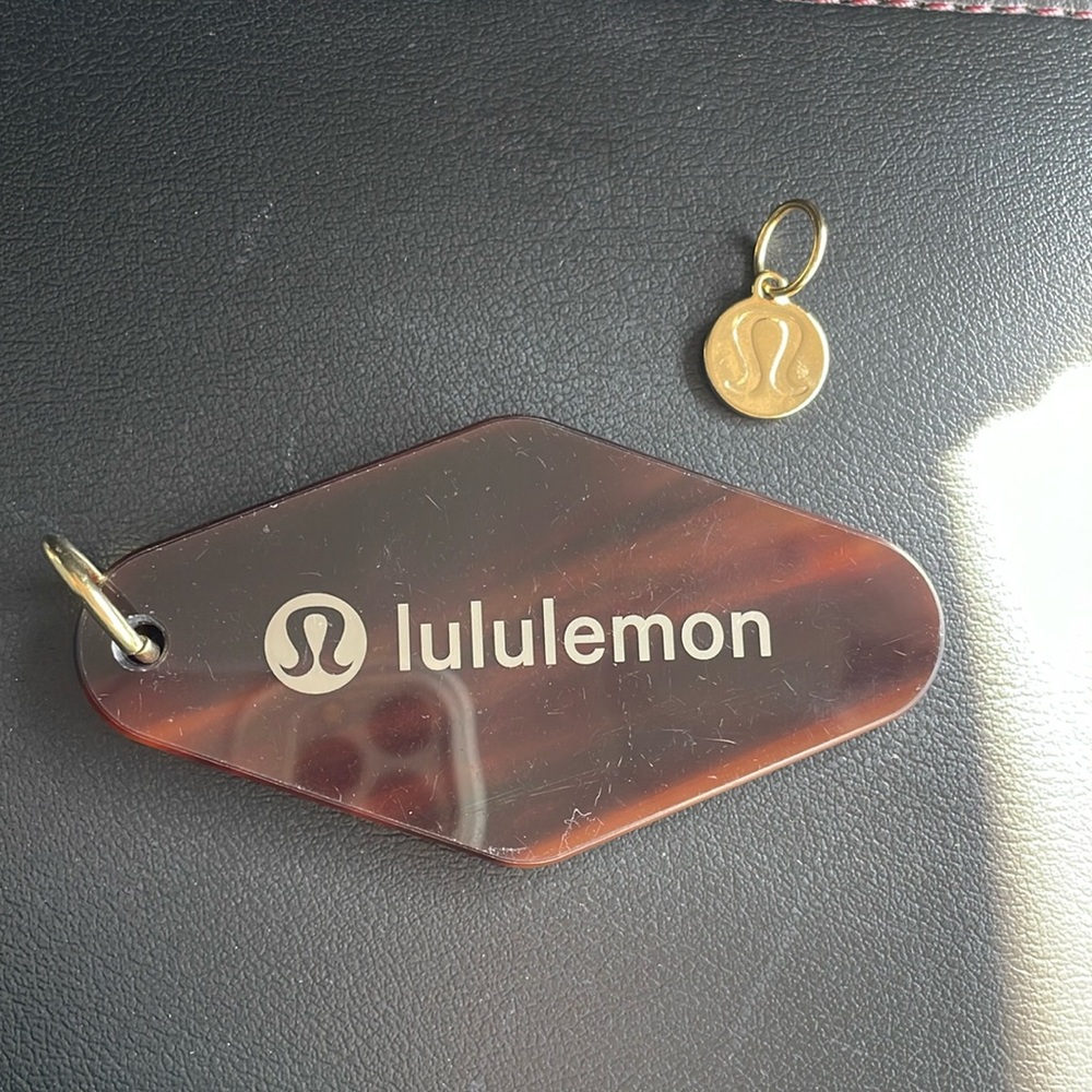 Lululemon keychain with additional Lululemon accessory golden brown