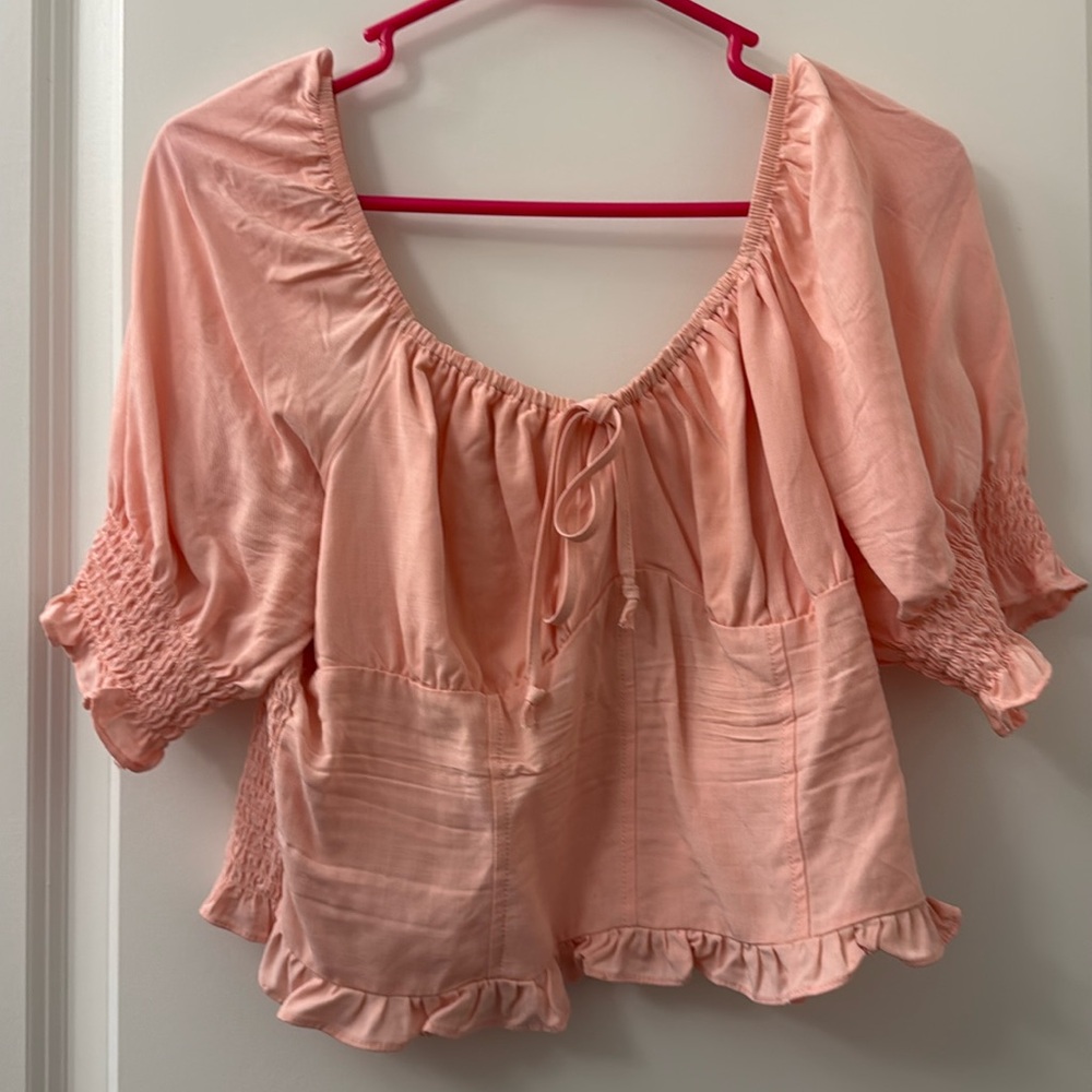 Pink Smocked Puff Sleeve Blouse with Ruffle Hem – Size L