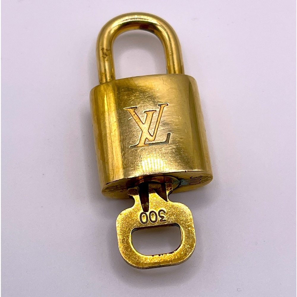 100% Authentic and pre loved Louis Vuitton - Gold Lock and Key set #300