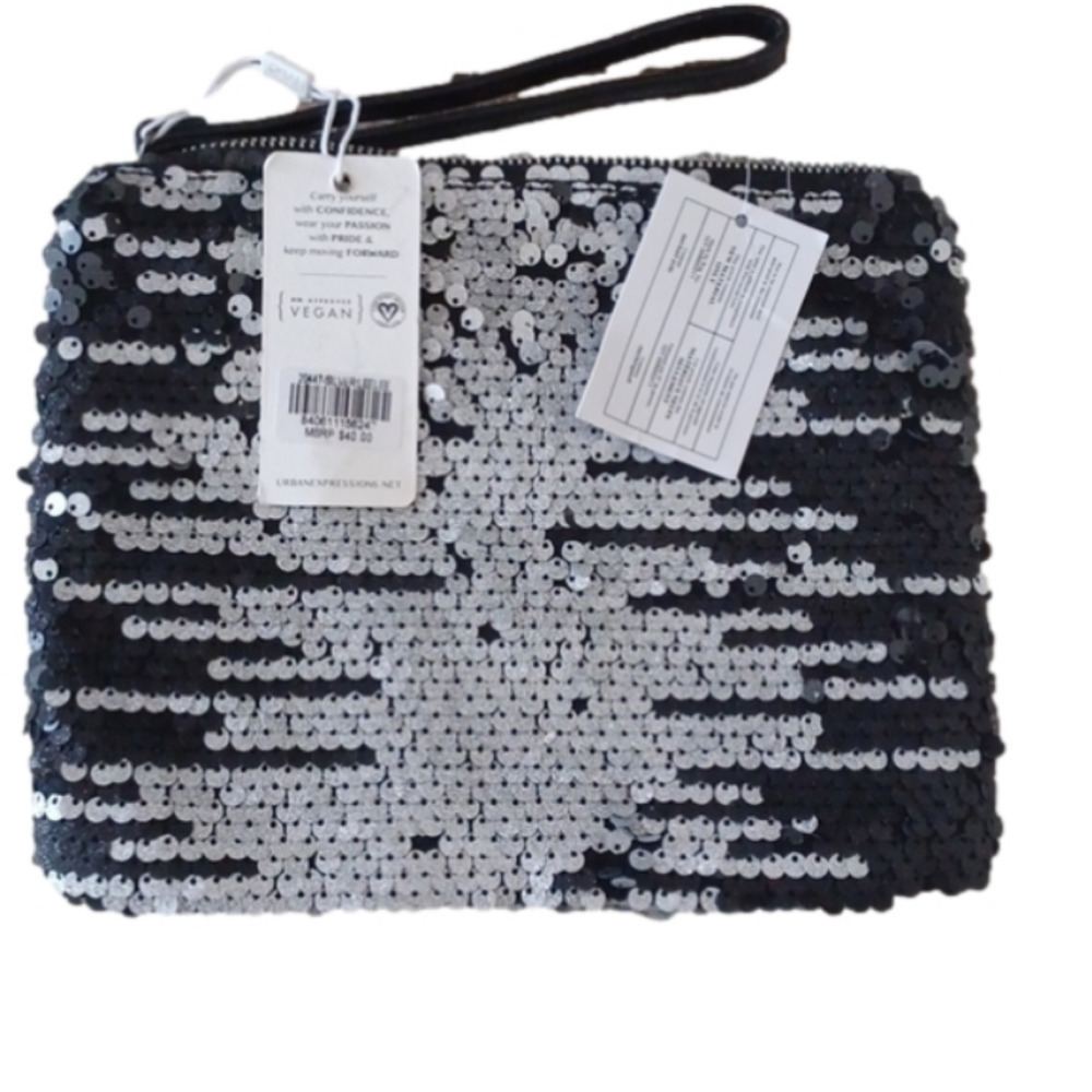 𝅺NWT  Urban Expressions cosmetic bag. Silver sequinded Vegan bag.