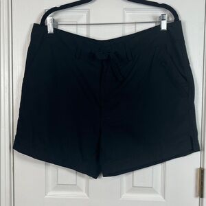 Magellan Outdoors black swim shorts size XL. Pockets 100% recycled polyester.