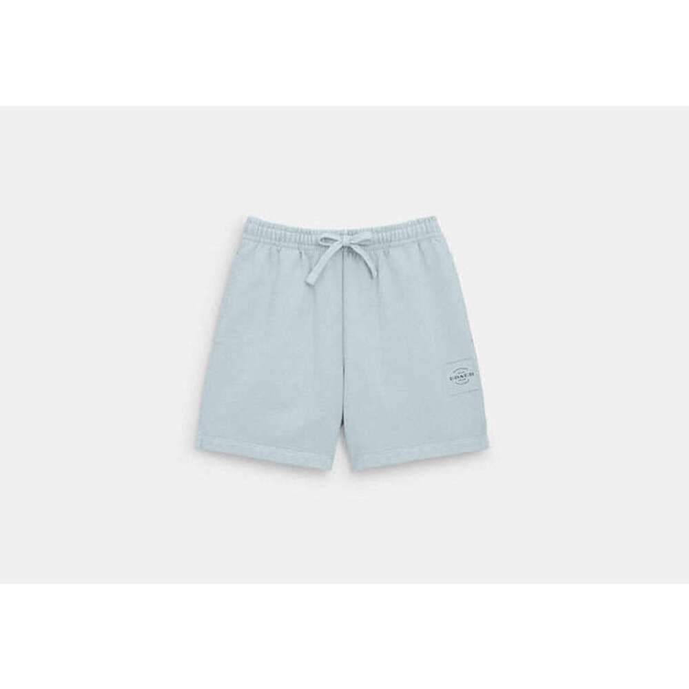 PENDING.  COACH Garment Dye Track Shorts