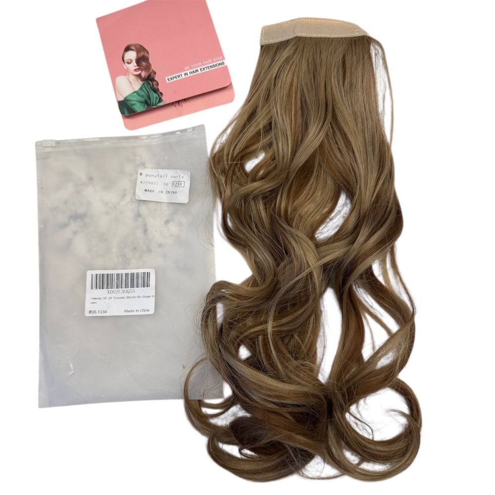 Curly ponytail hair extensions. 18' inches long has a blond mix color