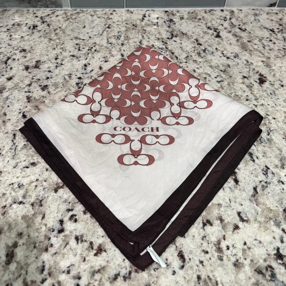 Coach Burgundy and Cream Coach
Silk scarf - Picture 1 of 9