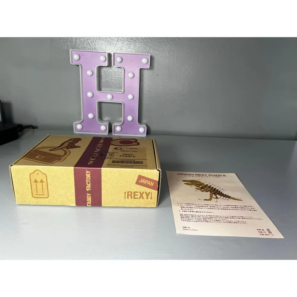 Coach Rexy Puzzle - Picture 2 of 7