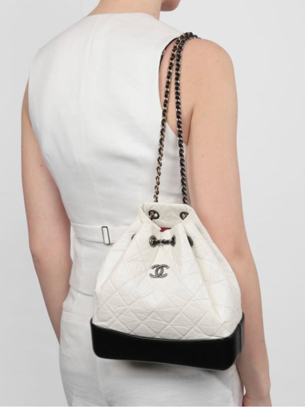 CHANEL White Quilted Lambskin Drawstring Shoulder Bag with Black Base