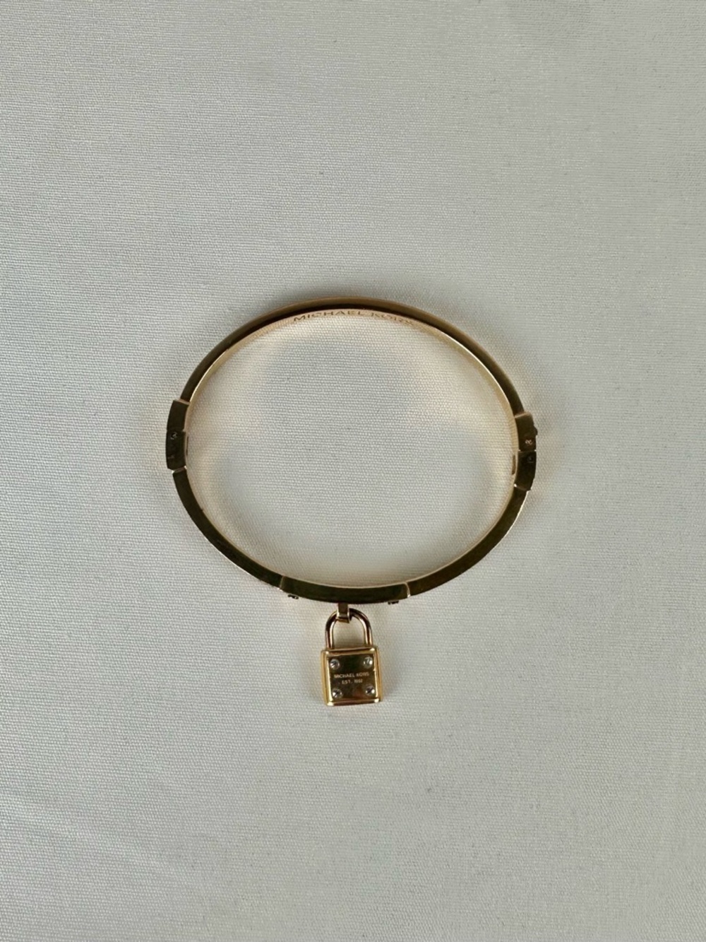 Michael Kors Brilliance Gold Plated Crystal Hinged Bracelet, Logo Pad Lock Charm - Picture 10 of 11