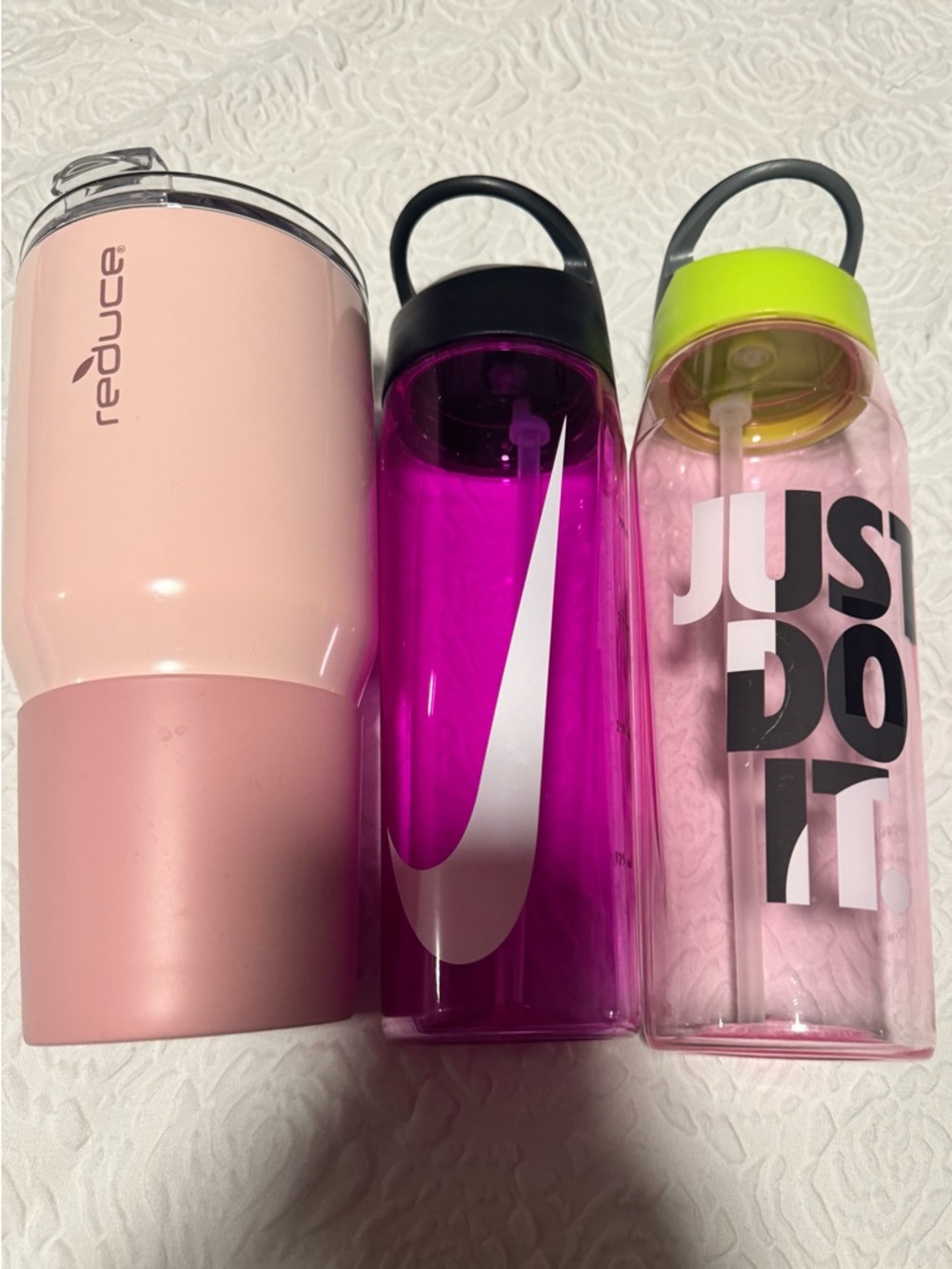Water bottles some Nike