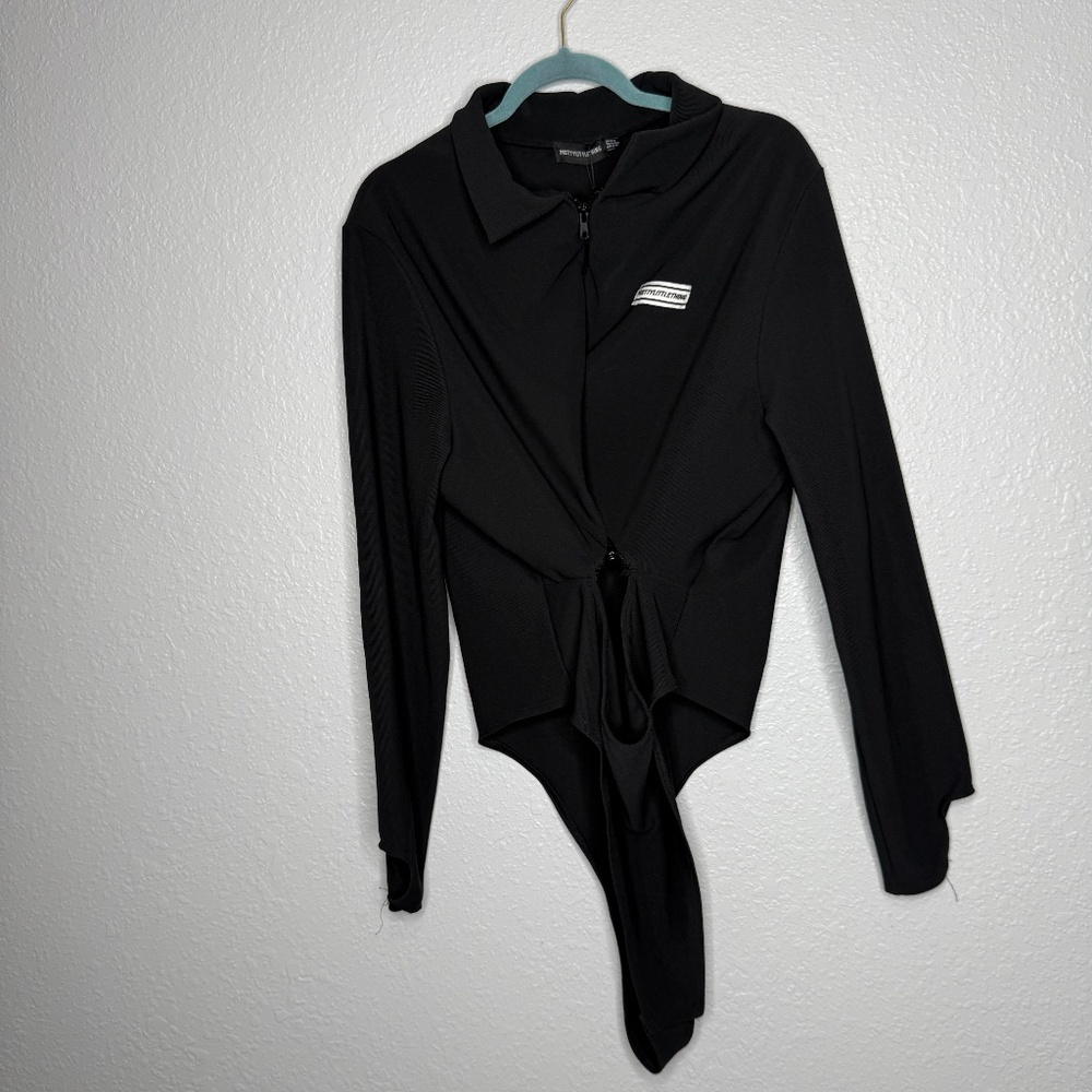 Pretty Little Thing Plus Black‎ Cut Out Zip Detail Rib Bodysuit