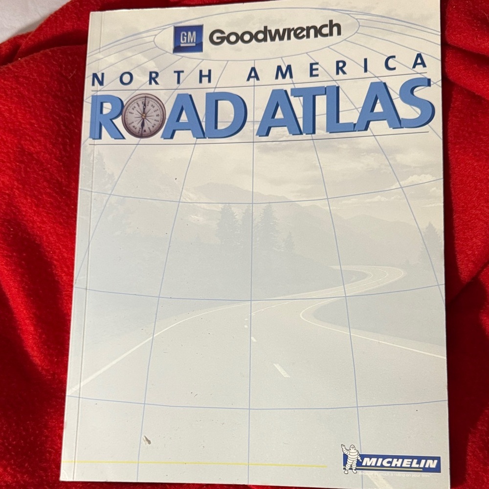 North America Road Atlas with White and Blue Cover