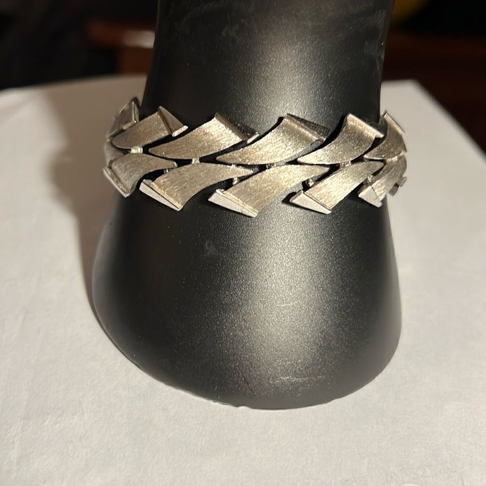 Trifari 7.5” brushed faux silver ladies bracelet.