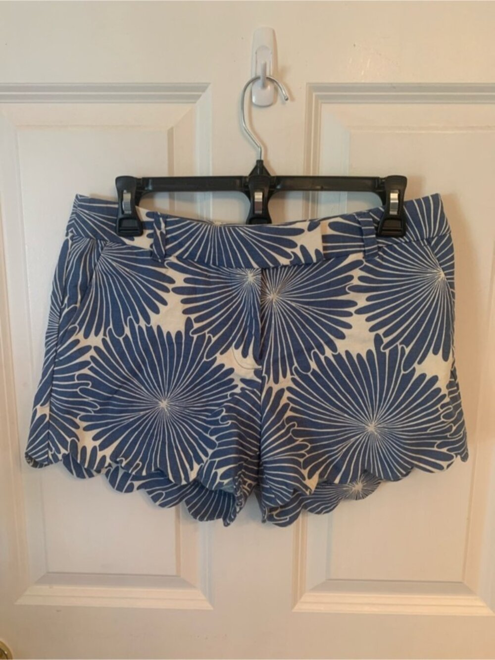 Women's shorts scalloped hem blue and cream.