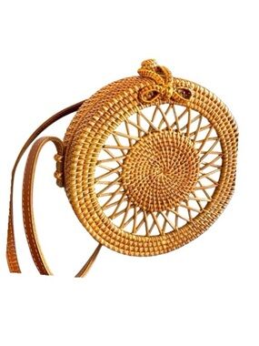 Handwoven Artisan Rattan crossbody bag, canvas lining, leather strap, patterned.