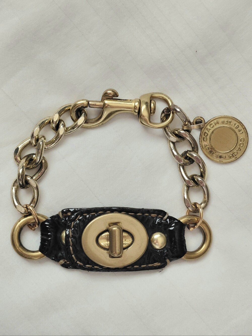 Coach Gold Brown Leather Turn Lock Charm Bracelet