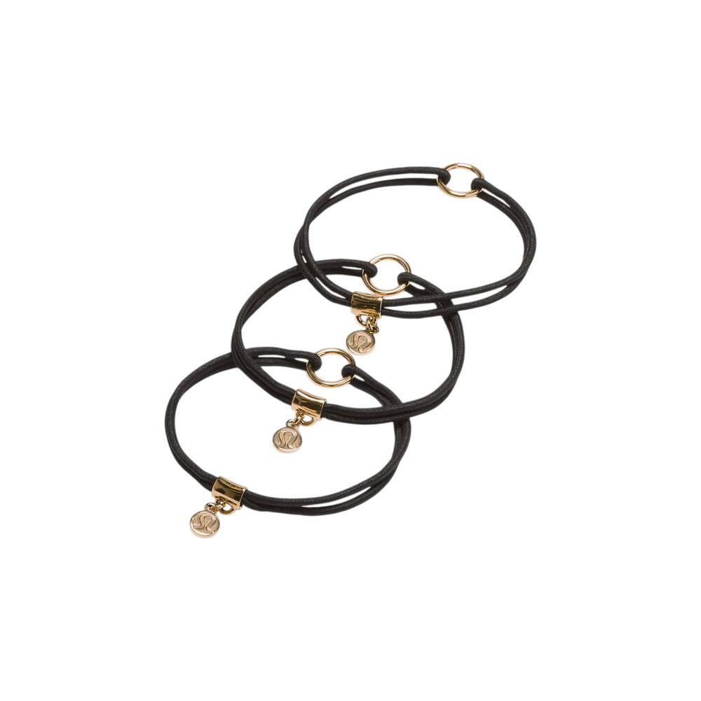 LULULEMON Logo Charm Hair Ties 3 Pack in Black & Gold